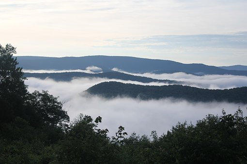 Overlook with fog in the valleys on the outlaw trails in west virginia